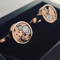 Discover the perfect blend of vintage and innovation with these steampunk watch cufflinks, crafted from real Omega watches. These non-working timepieces offer a distinctive, antique charm that makes them an exceptional gift for any watch enthusiast or steampunk aficionado. Each cufflink showcases intricate details and timeless design, ensuring a unique statement piece for both formal and casual occasions. Elevate your accessory collection with these remarkable cufflinks, combining the classic al Luxury Vintage Cufflinks For Collectors, Skeleton Dial Metal Jewelry As A Gift, Steampunk Round Jewelry For Formal Occasions, Steampunk Style Round Jewelry For Formal Occasions, Formal Steampunk Round Jewelry, Watch Cufflinks, Steampunk Watch, Omega Watches, Vintage Omega