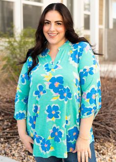 Front view of the plus size green floral top Shades Of Blue Green, Green Floral Top, Plus Jumpsuit, Swimming Swimsuit, Summer Vacations, Denim Joggers, Curvy Dress, Green And Yellow, Plus Dresses