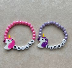 New to BaeKCreations these adorable unicorn  Charm Bracelets  Bracelets can also be ordered without charms. These make great birthday gifts or party favors  **Shop Disclaimer  Bracelets are made with small beads and therefore can present a choking hazard to small children. Never leave children unattended while they wear these bracelets so as to prevent them from putting them in their mouths. This shop assumes no responsibility for bracelets sold. This listing is for one bracelet Personalized Pink Novelty Bracelets, Customized Pink Novelty Jewelry, Adjustable Purple Charm Bracelet For Birthday, Pink Novelty Stretch Bracelet For Birthday, Novelty Pink Stretch Bracelet For Birthday, Cute Personalized Jewelry For Party Favors, Personalized Pink Novelty Charm Bracelet, Pink Novelty Bracelets For Party Favors, Novelty Pink Personalized Friendship Bracelets