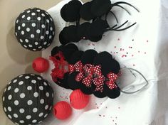 some minnie mouse ears and other decorations on a table