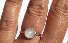 Moonstone 14k Solid Gold Ring - Rose Cut Moonstone Ring - Moonstone Gold Ring - Moonstone Engagement Ring - Gold Moonstone Ring - Made To Order. Rose cut Rainbow Moonstone (8 mm across), set in 14k solid gold, on top of a 14k solid gold band made of two round wires, that gives the ring a more ancient, rustic look. The band width is 2 mm. Shiny finish. MADE TO ORDER in your size. Ships in a gift box. Celestial Style Stackable Moonstone Ring, Celestial Stackable Moonstone Ring, Stackable Moonstone Ring, Everyday Moonstone Birthstone Ring, Everyday Round Moonstone Ring, Gold Moonstone Ring, Ring Moonstone, Moonstone Engagement, Solid Gold Band