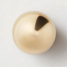 an image of a golden ball on white background