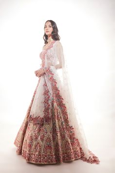 Ivory organza lehenga with fine multi-hued resham embroidery with a touch of sequins and glass beads paired with a matching blouse and organza dupatta with embroidered cutwork borderFrom Chamee and Palak 's The Wedding Edit collectionDELIVERY TIMEPlease allow 8-12 weeks for your outfit to arrive.FABRIC DETAILSOrganza and Raw silkProfessional cleaning only. Latest Bridal Lehenga, Organza Lehenga, Border Fabric, Hand Embroidered Flowers, Ivory Silk, Silk Lehenga, Organza Dupatta, Custom Bridal, Indian Fashion Dresses