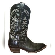 Tony Lama Men's Cowboy Boots Vintage Genuine Black Leather 03509016 Size 8d Effortlessly Tony Lama Men's Cowboy Boot Has A Vintage Quality. Genuine Black Leather Exterior Accented By Subtle Stitching Along The Upper That Gives This Western Boot A Lived-In Feel. The Narrow Round Toe And Standard Heel Provide A Relaxed Fit And Create A Classic Western Silhouette. The Cushioned Insole Allows For Lasting Support And Comfort Throughout The Day And The Single Stitch Welt Around The Leather Outsole Guarantees Durability For Extended Wear. In A Good Condition Please See Pictures For Details Vintage Black Plain Toe Boots, Black Snip Toe Boots With Rubber Sole, Black Moc Toe Boots With Leather Lining, Black Western Boots With Leather Lining, Black Snip Toe Boots With Leather Sole, Tony Lama Mens Cowboy Boots, Cowboy Boots Vintage, Western Silhouette, Boots Vintage