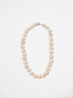 Add a touch of sophisticated, timeless beauty to your wardrobe with our Pink Pearl Necklace. Elevate any outfit with this elegant piece! 18 inches long Freshwater Pearls Luxury High Luster Necklaces For Formal Occasions, Elegant Long Single Strand Pearl Necklace, Elegant Single Strand Necklace, Classic Long Pearl White Necklace, Formal Necklaces With Round High Luster Beads, Formal High Luster Round Bead Necklaces, Luxury Long Necklace For Formal Occasions, Formal High Luster Round Beaded Necklaces, Elegant Single Strand Bridal Necklace