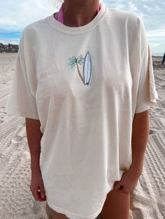 Vanilla Surfboard Tee – Sunkissedcoconut Outer Banks Shirt, Luxury Paints, Swimwear Sets, Embroidered Sweatshirts, Mens Tees, Surfboard, Comfort Colors, Cool Shirts, To Create