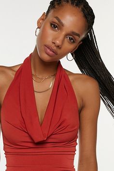 Sleek Silence + Noise top in a halter neckline style. Designed in a soft & stretchy knit featuring a plunging v-neckline with cowl draping and finished with an open back. Find this better-than-basic halter top only at Urban Outfitters. Features Silence + Noise Coyote cowl neck top Cropped halter top Soft and stretchy knit Plunging v-neckline with halter strap Draping on the bust and v-hem bodice Open back Sleeveless Slim body-skimming fit Cropped length Easy pull-over style UO exclusive Content Seamless Halter Top For Night Out, Seamless Solid Color Halter Top For Night Out, V-neck Halter Top For Party, Solid V-neck Halter Top For Party, Seamless Triangle Halter Top For Party, Stretch Halter Neck Top For Date Night, Chic Seamless Halter Top For Party, Stretch Halter Neck Crop Top For Date Night, Seamless Halter Neck Crop Top For Party