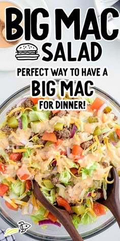 a big mac salad in a glass bowl with wooden spoons on the side and text overlay that says,'perfect way to have a big mac for dinner '