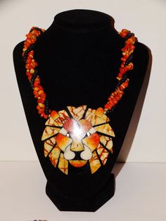 "Free Shipping VGE 1970,s Sponge Apple Coral Inlaid 23\" Lion Necklace. Lion head size 3 1/4\" x 3\" Excellent condition." Collectible Multicolor Beaded Jewelry, Multicolor Beaded Collectible Jewelry, Multicolor Costume Jewelry Necklace For Collectors, Unique Long Orange Necklace, Swan Logo, Lion Necklace, Infinity Pendant, Swarovski Crystal Bracelet, Garnet Necklace