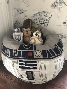 star wars themed bean bag chair with stuffed animals