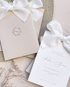 the instagram page on instagram shows an image of wedding cards with white bows