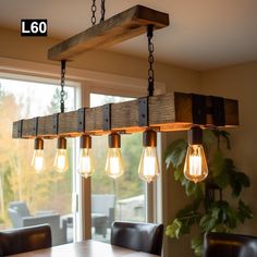 a wooden beam chandelier with light bulbs hanging from it