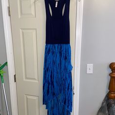 Navy Blue Top. Approx Mid-Thigh To Knee Length Slip Lining (As Shown In Pictures) With Flowy High-Low Material Over. String To Tie In Back. No Tags, But Never Worn. Blue Stretch Maxi Dress For Vacation, Blue Stretch Sundress Mini Dress, Blue Stretch Sundress, Stretch Blue Sundress, Blue Stretch Maxi Dress For Beach, Blue Stretch Maxi Dress For Day Out, Blue Stretch Sundress Maxi Dress, Stretch Blue Bohemian Dress, Blue Stretch Bohemian Dress