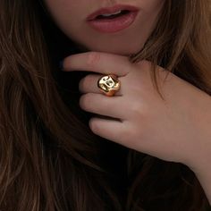 14k recycled gold Skull size: Appx 20x20mm (taken from a size 6 ring) Unsure of your ring size? Click HERE. Made in NYC Our Molten Skull Ring is a mesmerizing piece of statement jewelry, radiating an aura of both refinement and rebellion. Whether worn as a statement piece or a memento mori - a reminder of our mortality so that we live life NOW - our Molten Skull Ring is a testament to the timeless appeal of fine craftsmanship and the enduring fascination with the enigmatic allure of the skull mo Jewelry Gift Guide, Lock Necklace, Gold Skull, Dream Gift, Diamond Charm, Skull Ring, Opal Earrings, Recycled Gold, Holiday Fashion