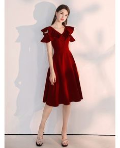 Shop a line knee length burgundy party dress with ruffled neckline online. All instock with free shipping. Pro since 2009. A-line Ruffled Midi Dress For Prom, A-line Midi Dress With Ruffles For Prom, Solid Color Ruffle Midi Dress For Party, Solid Ruffled Midi Dress For Party, Burgundy A-line Midi Dress For Party, Knee-length Ruffled Dress For Prom Season, Party A-line Midi Dress With Ruffles, Burgundy Ruffled Dress For Date Night, Ruffled Midi Dress For Winter Evening