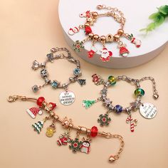 You can receive all the objects in the first main picture after you take a photo Wear your holiday spirit this winter with our Christmas Beaded Charm Bracelet Craft Kits! Each kit comes with a variety of beautifully colored beads and charms so you can create a piece of jewelry all your own. Perfect for use at school, over winter break, or with family and friends- no matter where you take this kit it is sure to bring a joyful experience. Children and adults alike enjoy these festive holiday bracelets! Quantity: 1 bracelet (each bracelet has a different style, choose according to your favorite charm) Color: Gold/Silver Uses: Christmas charm bracelet DIY random match Add a little creative fun to your Christmas romantic holiday, gifts for kids, friends, family and loved ones  Instructions  War Christmas Jewelry Diy, Antler Pendant, Holiday Bracelets, Beaded Charm Bracelet, Bracelet Craft, Bead Diy, Diy Charm, Gift Bracelet, Cute Christmas Tree