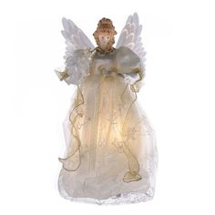 an angel figurine sitting on top of a white cloth covered bag with lights in it