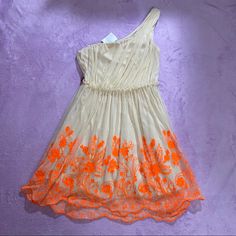 Nude Dress With Bright Orange Embroidery, Never Worn. One Shoulder Side Zipper Closure Skirt Has Just The Right Amount Of Fluff And Swing! Fabric Feels Light, Airy, Soft, And Elegant Has Belt Loops But No Belt Included Very Unique And Showstopping Art Deco Avant Garde Hits At/Above Knee Depending On Height (1-2in Above Knee For Me: 5’0”) Juniors Size 7, Could Fit Women’s Small/Medium Measurements: Pit To Pit: 14in Shoulder To Hem: 33-34in Offers And Bundles Welcome! Orange Embroidery, Nude Dress, Studio City, Above Knee, Bright Orange, Side Zipper, One Shoulder Dress, Shoulder Dress, Colorful Dresses