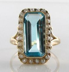 ad eBay - Presented here is a stunningly beautiful handmade Huge English 9K CT Gold Art Deco inspired near flawlessNatural Blue Topaz and24 Fresh Water Pearl Ring. This is a substantial ring full of Art Deco charm. Formal High Luster Blue Jewelry, Elegant Blue Jewelry With High Luster, High Luster Blue Jewelry For Anniversary, Luxury Gold Topaz Ring In Art Deco Style, Luxury Gold Art Deco Topaz Ring, Formal Blue High Luster Jewelry, Blue Pearl Ring For Anniversary, Elegant Blue High Luster Jewelry, Elegant Blue Pearl Ring As Gift