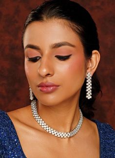 White Finish Faux Diamond Necklace Set Zevar By Geeta - Fabilicious Fashion Luxury White Necklace For Diwali, Luxury Diamond Necklace For Receptions, Luxury White Necklaces For Diwali, Luxury White Fusion Bridal Necklace, Luxury White Fusion Style Bridal Necklace, Luxury Bollywood White Bridal Necklace, Luxury Traditional Diamond Necklace, Luxury Necklaces With Matching Earrings For Reception, Traditional Luxury Diamond Necklace