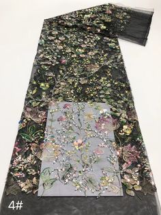 we offer a variety of fashion handmade fabric，those are widely use for wedding dress，garment and fashion cloth. Quantity: This listing is for 1 yard. You will get uncut piece if you buy more than 1 Yard.， we always package it 15 yards for one roll，the width is about 130cm Material ： mesh ，Rayon,polyester. Symmetrical embroidery floral pattern, with lovely flowers in the middle, scalloped border. You can also cut and use separately. Perfect for dress, tops, wedding veil.  You can split the piece Elegant Sequin Fabric For Spring Wedding, Elegant Spring Wedding Sequin Fabric, Spring Embellished Lace Embroidered Fabric, Spring Embellished Embroidered Lace Fabric, Elegant Embroidered Sequin Fabric For Spring, Elegant Embroidered Fabric With Sequins For Spring, Elegant Spring Embroidered Fabric With Sequins, Multicolor Sequin Fabric For Spring Wedding, Spring Multicolor Sequin Fabric For Weddings