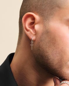 Be bold and defiant in our men's silver Dagger Cross Earring. This single earring features classic silver hoop with a daring dagger charm for playful, eye-catching movement. As always, our earrings are crafted with a 925 silver post for sensitive skin. Collect two to make it a set! Mens Earings Styles, Mens Earings, Cross Earring, Solid Gold Chains, Men Earrings, Cross Earrings, Silver Shop, Single Earring, Men's Rings