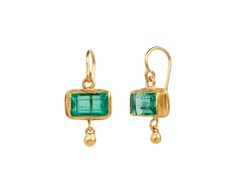 With their geometric design and vibrant color, these Judy Geib earrings have a playful elegance. The bright green rectangular emeralds are framed in bezels of 18K yellow gold and hang from 18K yellow gold ear wires. Anchoring the composition are tiny, dangling 22K yellow gold ball drops. total length : just under 1"emeralds : 5mm x 9mm : 4.99cttw22K yellow gold ball drop : 3mm diameter18K yellow gold ear wires Rectangular Yellow Gold Earrings With Gemstone, Emerald Rectangular Earrings For May Birthstone, Rectangular Gemstone Earrings For May Birthstone, Modern Yellow Gold Emerald Cut Earrings, Fine Jewelry Emerald Rectangular Earrings, Gold Emerald Rectangular Earrings, Gold Rectangular Emerald Earrings, Rectangular Emerald Earrings Fine Jewelry, Rectangular Emerald Gemstone Earrings