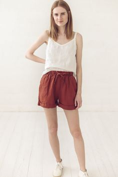 "DETAILS * Linen shorts with two side pockets * With elastic band around and wee belt to tie it up * Cute and Elegant, suit for summer days * Made from soft wash medium weight (185 gsm) 100 % European linen fabric * Height of the model is 177 cm (5' 8\") and she is wearing shorts in size XS/S and burnt orange color * The full shorts length is 40 cm (15.7\") * Please choose another color and size on the right * Product number: SH02 CARE LABEL * machine wash gentle (40 C/104 F) * dry gentle on low Summer Drawstring Short Pants, Summer Short Pants With Drawstring, Summer Drawstring Bottoms With Short Inseam, Summer Bottoms With Drawstring And Short Inseam, Summer Drawstring Bottoms, Summer Bottoms With Tie Waist, Summer Style Short Bottoms With Tie Waist, Summer Shorts With Tie Waist, Linen Shorts Outfit