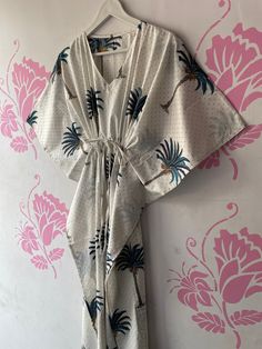 "BohoRobes Palm Tree Printed Kaftan Dress, Beach Cover Gown, Nightwear Dress, Long Caftan For Women, Boho Maxi Dress Size - Free Size Length - 44/ 48/ 52 Inches Bust/chest size - 120 CM/ 48 Inches Fabric - 100% Cotton Pattern - Palm Tree Print Kaftan has Adjustable Drawstring Waist to loose or tight , Kaftan has V Shape Neck Which is 8\" Inches Deep. Kaftan Is Multi-purpose and can be worn as a cover up at the Beach ,Lounge wear ,sleepwear ,Pregnant Women Hospital Gown for Newly Moms ,Maxi Dress ,Free Dress etc . This kaftan, made from incredibly soft and lightweight cotton, is versatile for many occasions. Perfect for a swimsuit cover up on the beach or by the pool, with shorts and a tank top or over a summer dress. Can be also worn with a glam belt for a more dressed up look for lunch. I Tropical Style Cotton Beach Dress, Tropical Printed Cotton Dresses, Tropical Cotton Beach Dresses, Tropical Cotton Printed Dress, Summer Dresses With Kimono Sleeves In White, White Summer Dresses With Kimono Sleeves, White Summer Dress With Kimono Sleeves, Bohemian Cotton Beach Dress For Brunch, Summer Beachwear Kaftan For Brunch