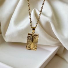 TIMELESS- This exquisite 18k gold necklace is the epitome of sophisticated style and minimalism. Delicately crafted by hand, the dainty chain and timeless design make it a truly timeless piece.  It's waterproof, anti tarnish, and adjustable, making it perfect for everyday wear. The perfect accessory to elevate any look.  ☆Waterproof  ☆Hypoallergenic ☆Anti tarnish ☆40cm + 5cm extension for extra comfort and styling ✨ABOUT CRESCENT JEWELRY DESIGNS All jewelry is made by Crescent Jewelry Designs in the heart of Nashville Tennessee. Designing unique and beautiful jewelry is our passion, and our goal is to make sure you are 100% satisfied with the products. Each piece is made with hypoallergenic earring posts and free from lead and nickel. If you have any questions or concerns regarding the pro Tarnish Resistant Square Pendant Necklace For Gift, Gift Tarnish Resistant Square Pendant Necklace, Minimalist Jewelry With Rectangular Clavicle Chain Pendant, Minimalist 14k Gold Necklace With Square Pendant, Minimalist 14k Gold Filled Chain Necklace As Gift, Minimalist 14k Gold Square Pendant Necklace, Minimalist Square Pendant Necklace As Gift For Her, Minimalist Rectangular Necklace As Gift For Her, Minimalist Rectangular Necklaces As Gift For Her