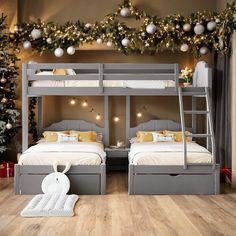 two bunk beds in a bedroom decorated for christmas