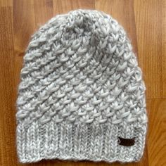 Grey Adidas Knitted Beanie. Never Worn Casual Winter Knitting Pattern For Soft Knit, Gray Knit Beanie One Size, Cozy Cable Knit Crochet Hat For Fall, Cozy Chunky Knit Hat, Casual One Size Cable Knit Beanie, Casual Warm Acrylic Yarn Knitting Pattern, Casual Gray Knitting Pattern, Casual Gray Crochet Hat For Fall, Casual Acrylic Soft Knit Pattern