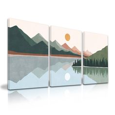 three canvases with mountains and trees in the background, one has a lake on it