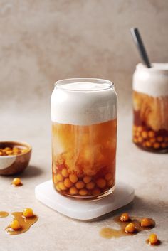 a jar filled with food sitting on top of a table