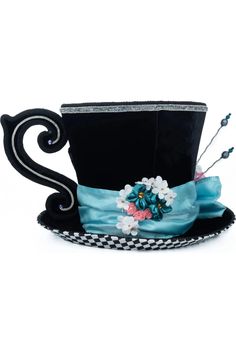 a black hat with flowers on it and a blue satin ribbon around the top,