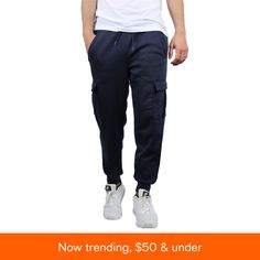 in stock Winter Sports Sweats With Pockets, Sporty Fleece Bottoms For Outdoor, Sporty Outdoor Fleece Bottoms, Sports Bottoms With Pockets For Sports Season, Sporty Solid Cargo Pants For Winter, Sporty Cargo Pants For Winter, Winter Sports Bottoms With Pockets, Solid Color Sports Sweats With Pockets, Streetwear Sportswear Joggers With Pockets