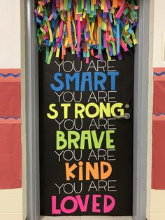 a door with the words you are smart, strong and brave on it's side