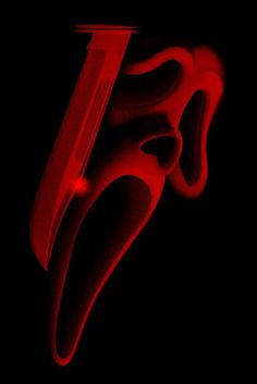 an abstract red and black photo with the letter j in it's center, on a black background