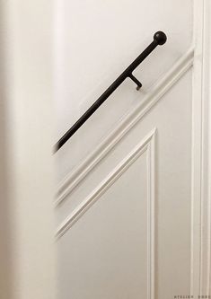 an open door with a black handle on it