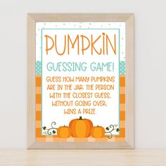 a pumpkin guess game is displayed in a wooden frame