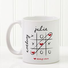 a white coffee mug with the words julia and xoxo written in red on it