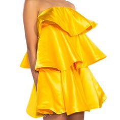 Honor The Spotlight In The Callie Celebrate Me: Golden Yellow Flower Layered Mini Dress. We’re Obsessed With The Satin Base And Voluminous Tiered Silhouette. Complete With A Strapless Neckline With Inner Elastic For A Secure Fit, A Smooth Inner Lining, A Mini Length, And A Concealed Back Zipper Closure. - 95% Polyester 5% Spandex (All Measurements Approximate From Size Small) -26” Shoulder To Hem - Model Is 5'11" Grab This Callie Celebrate Me: Golden Yellow Flower Layered Mini Dress Now. Golden Yellow, Dress With Bow, Yellow Flowers, Strapless Dress, Mini Dress, Yellow, Womens Dresses, Celebrities, Dresses