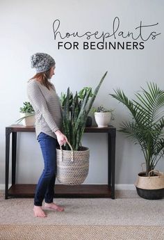 a woman standing in front of a potted plant with the words houseplants for beginners