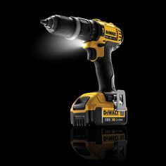 a drill is shown with its light on it's head and in front of the black background