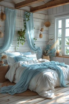 a bed room with a neatly made bed and lots of pillows on top of it