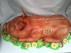 there is a cake shaped like a sleeping pig