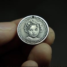 This vintage looking coin pendant necklace can be personalized with your photo, your cat or your dog photo portrait, made of solid silver.