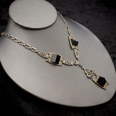 "Fine Antique Art Deco 925 Sterling Silver + Onyx + Marcasite Lavalier Pyramid Necklace- Authentic Jewelry of the 1920s Measurements: Chain: 18.5\" + 2 1/8\" (lavalier pendant) Display bust is not life size, so compare chain length (above) with a necklace in the personal collection of the recipient or yourself in order to be sure how the piece will lay on the wearer. Excellent antique condition, no missing stones. Reference photos provided for you to verify condition. Disclaimer on multiple purc Art Deco White Gold Necklace With Gemstone, Art Deco White Gold Gemstone Necklace, White Gold Art Deco Gemstone Necklace, Art Deco Pendant Necklace For Formal Occasions, Hallmarked Sterling Silver Necklaces For Evening, Formal Art Deco Necklace With Polished Finish, Antique Hallmarked Jewelry For Evening, Art Deco White Gold Necklace For Evening, Antique White Gold Evening Jewelry