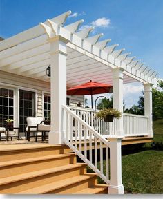 an image of a porch with stairs and railings on the bottom level, which is also attached to a deck