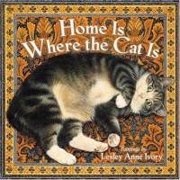 a cat laying on top of an orange and black carpet with the words home is where the